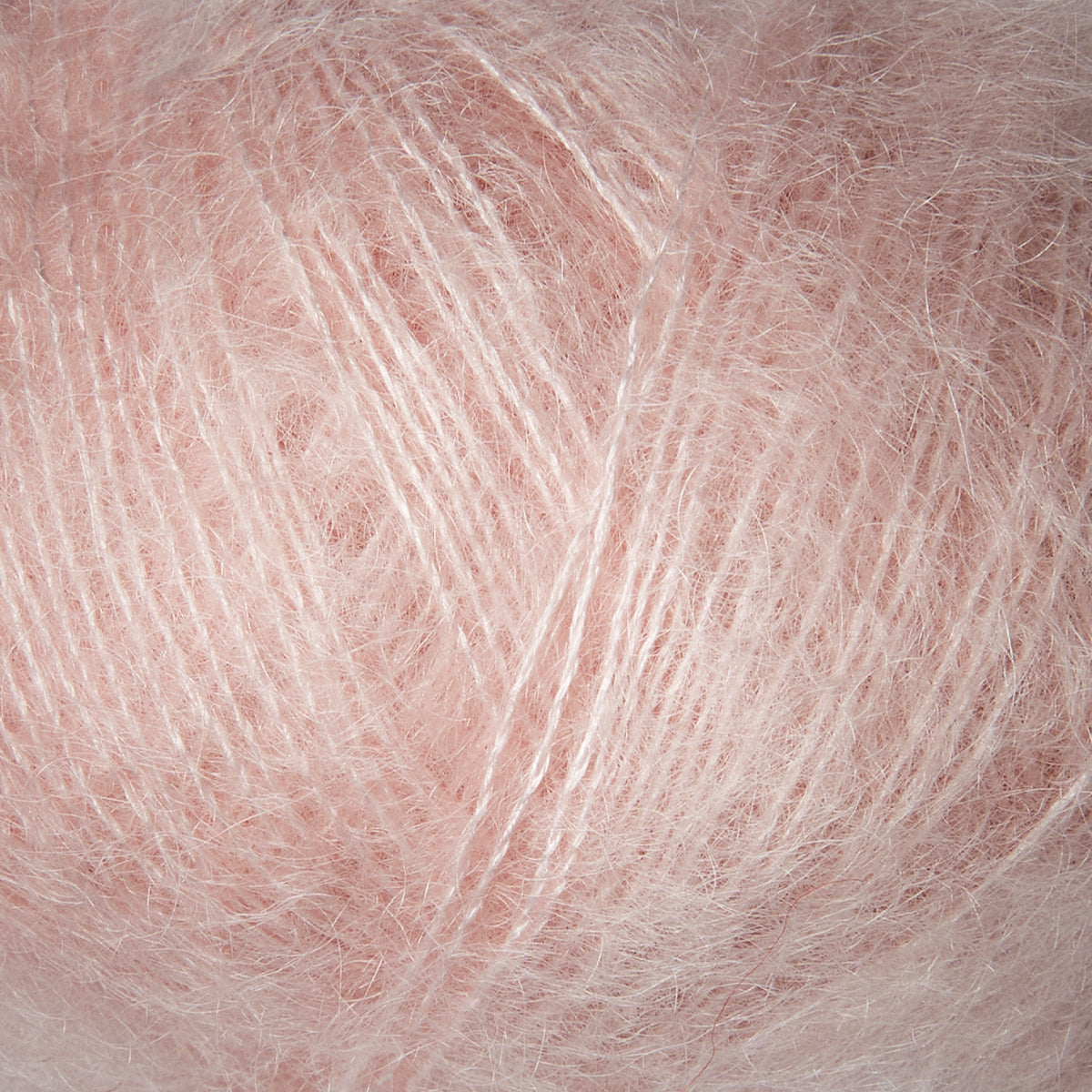 Close-up of Knitting for Olive Soft Silk Mohair yarn in Cherry Blossom