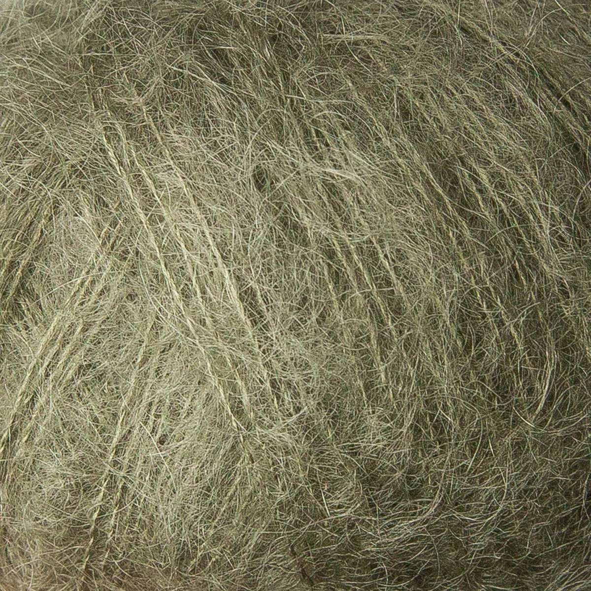Close-up of Knitting for Olive Soft Silk Mohair yarn in Dusty Olive