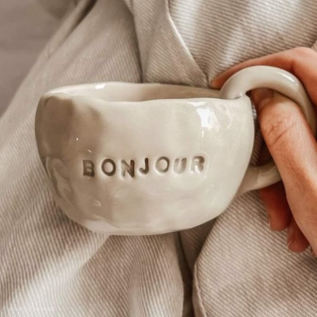 Handmade ceramic white mug with custom text