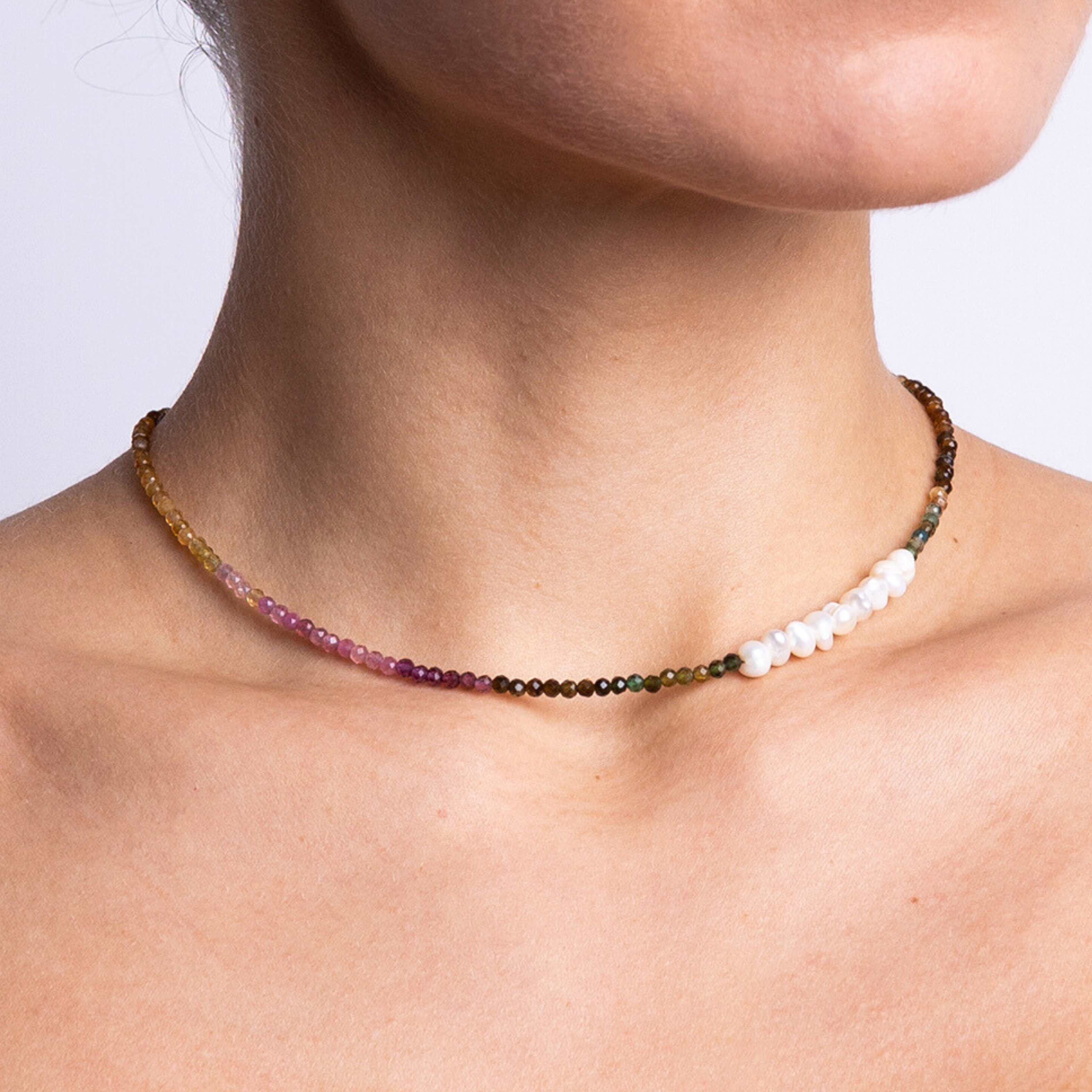 Handmade choker necklace featuring multicolor tourmaline gemstones with a cluster of freshwater pearls, crafted from the Nacre Creative Mother Earth DIY Jewelry Kit.