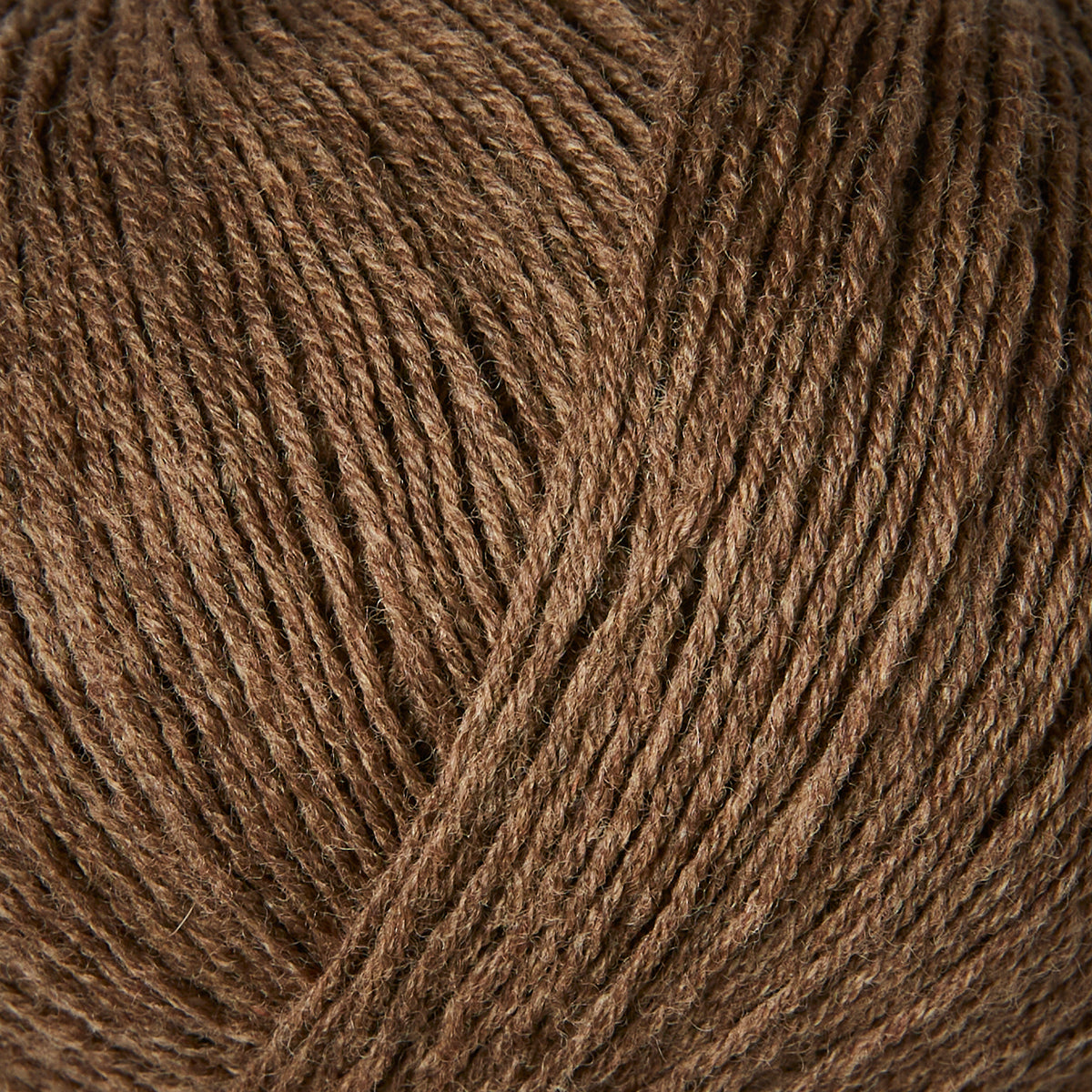 Close-up of Knitting for Olive Merino yarn in Bark