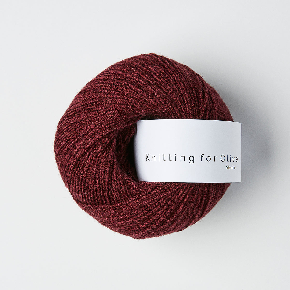 Knitting for Olive Merino yarn in Bordeaux