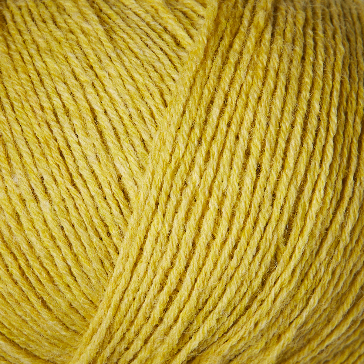 Close-up of Knitting for Olive Merino yarn in Quince yellow