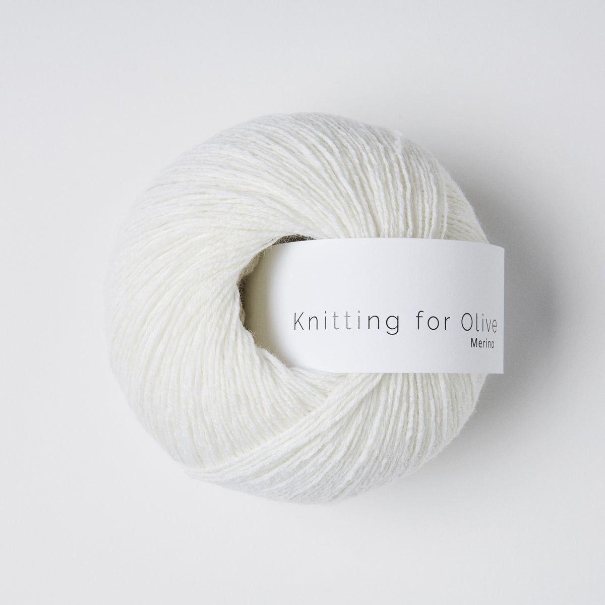 Knitting for Olive Merino yarn in Snowflake