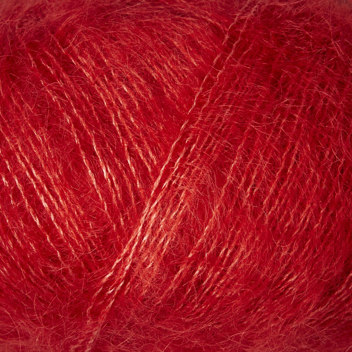 Close-up of Knitting for Olive Soft Silk Mohair yarn in Red Currant