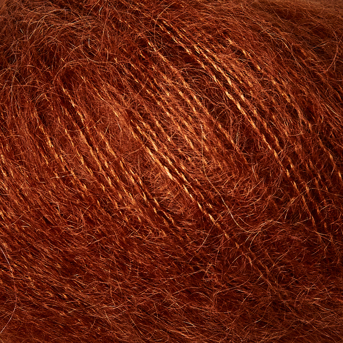Close-up of Knitting for Olive Soft Silk Mohair yarn in Rust